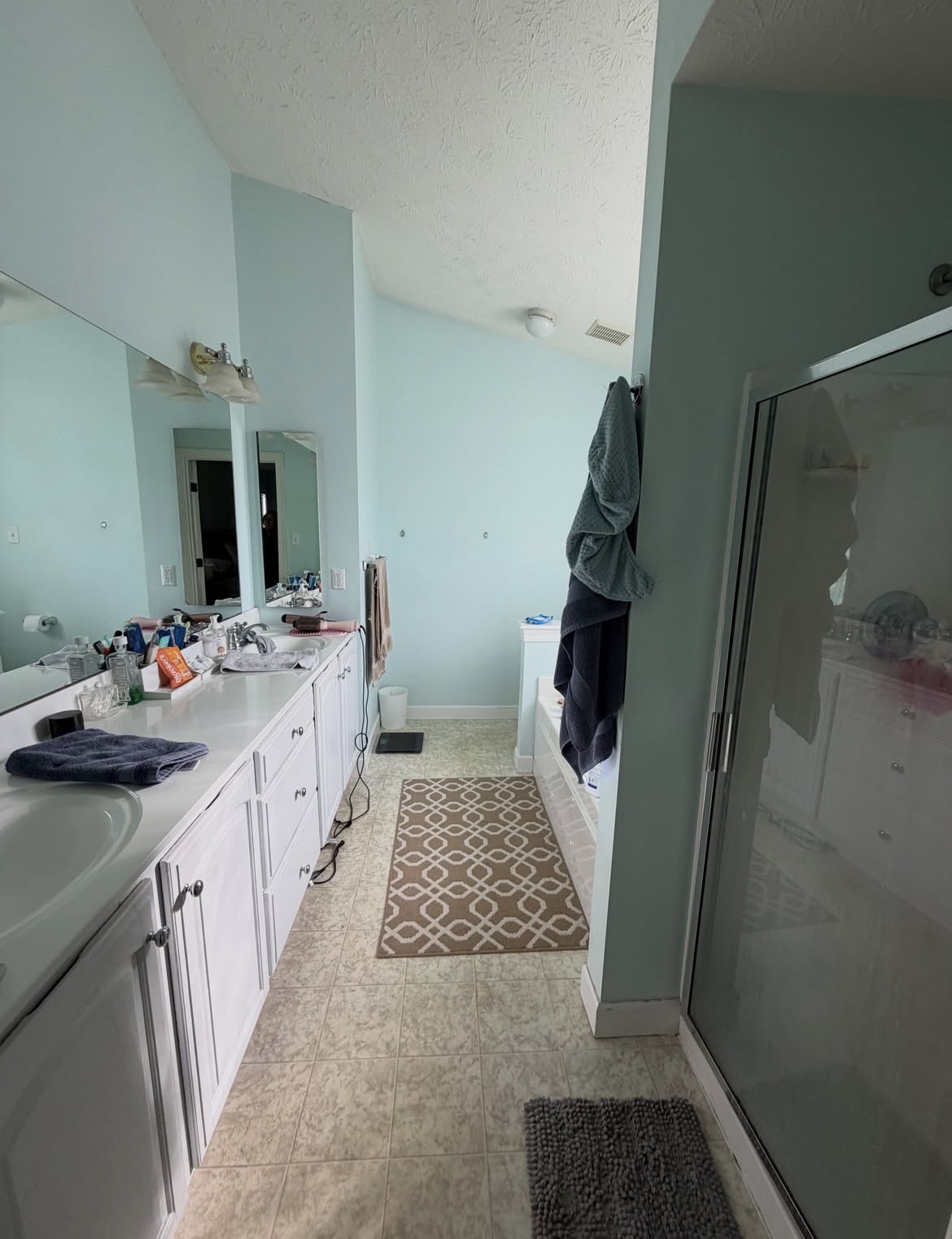 Bathroom with long vanity — Before